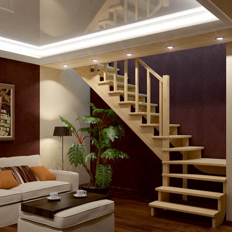 Забежная деревянная лестница в интерьере частного дома